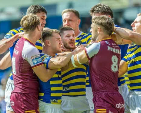 Action between Warrington Wolves and Huddersfield Giants