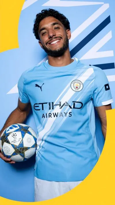 Omar Marmoush smiling