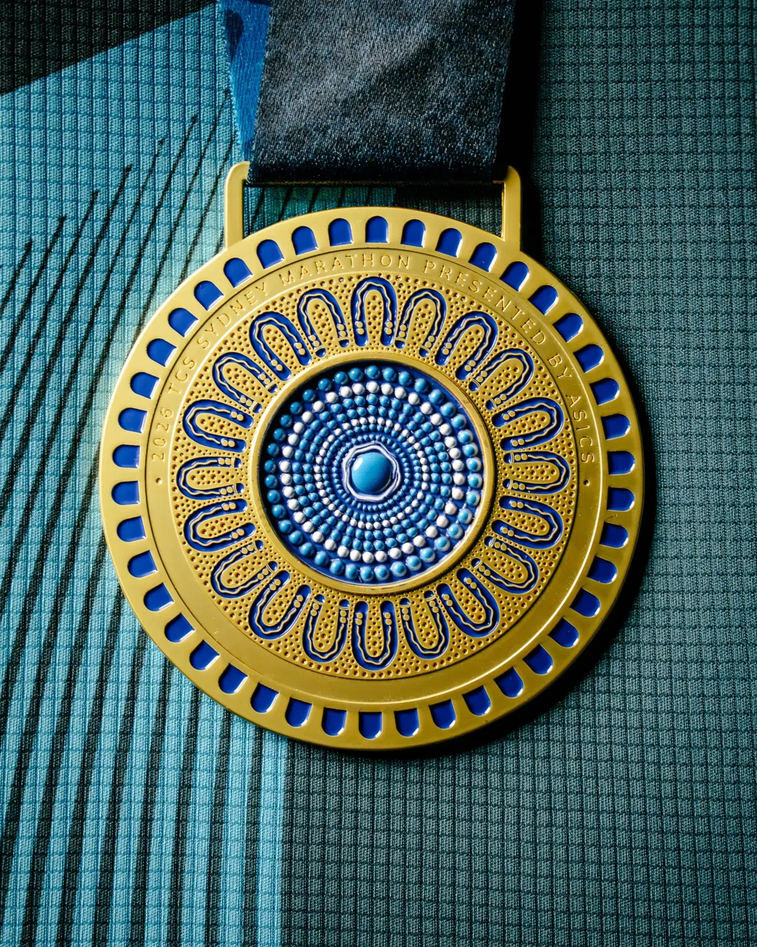 Instagram: sydney_marathon Front of the Sydney Marathon medal.
