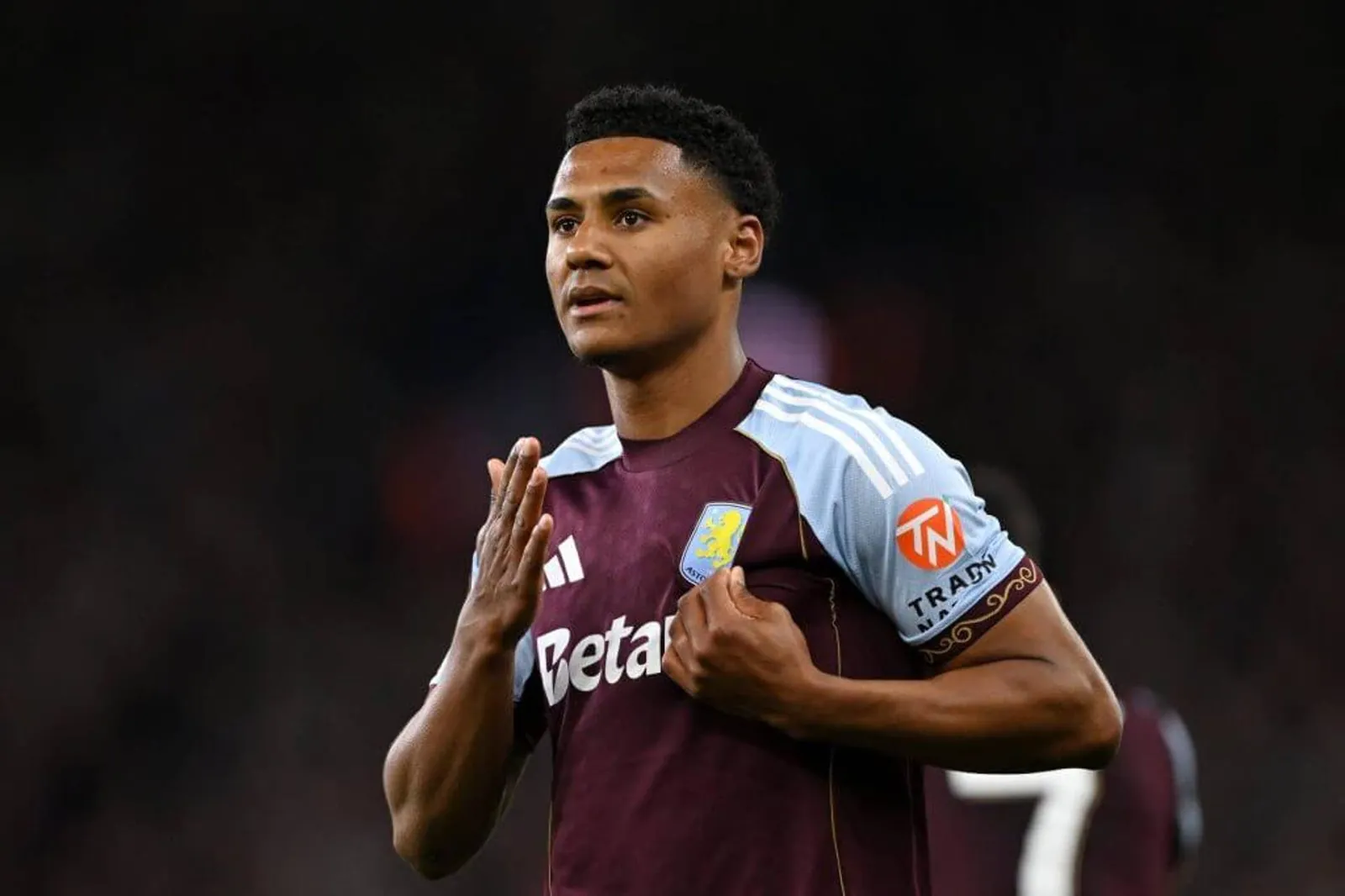 Ollie Watkins, wearing the recognisable claret and blue home shirt of Aston Villa.
