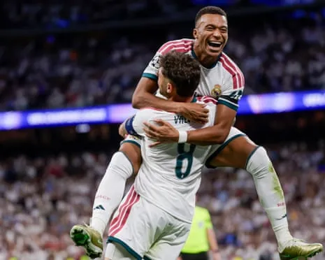 Fede Valverde (left) celebrates with Kylian Mbappé after scoring Real Madrid’s second goal against Inter.